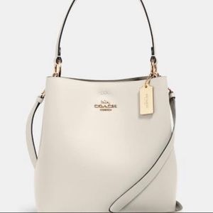 Coach cream colored small bucket bag